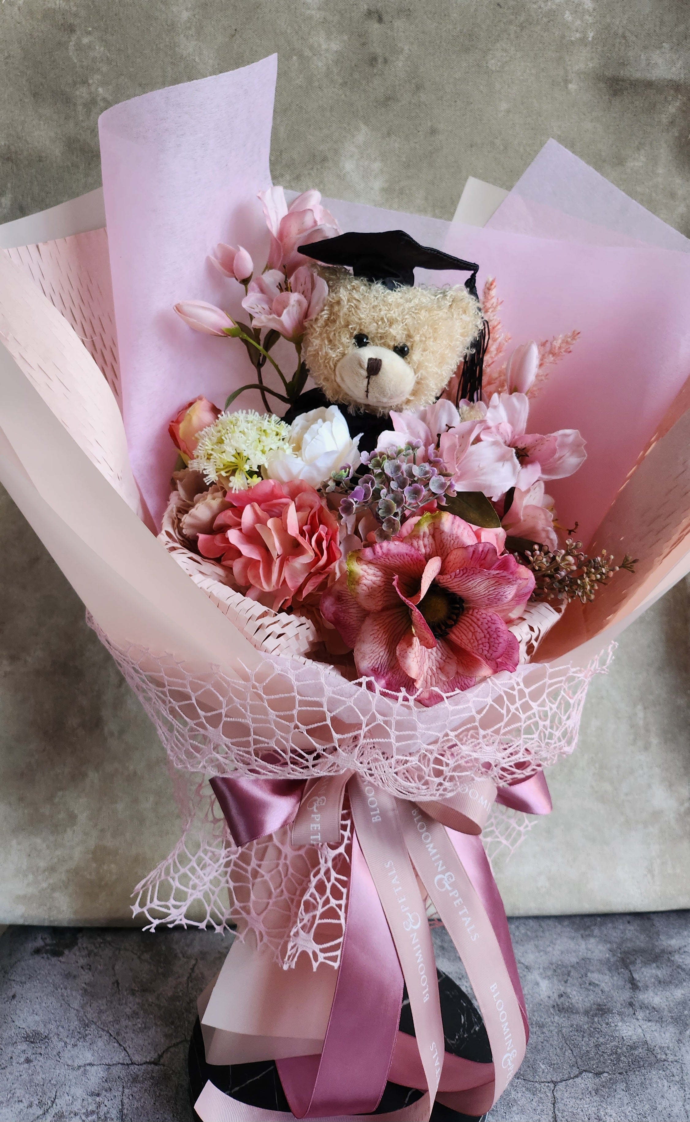 bouquet of flowers with teddy bear