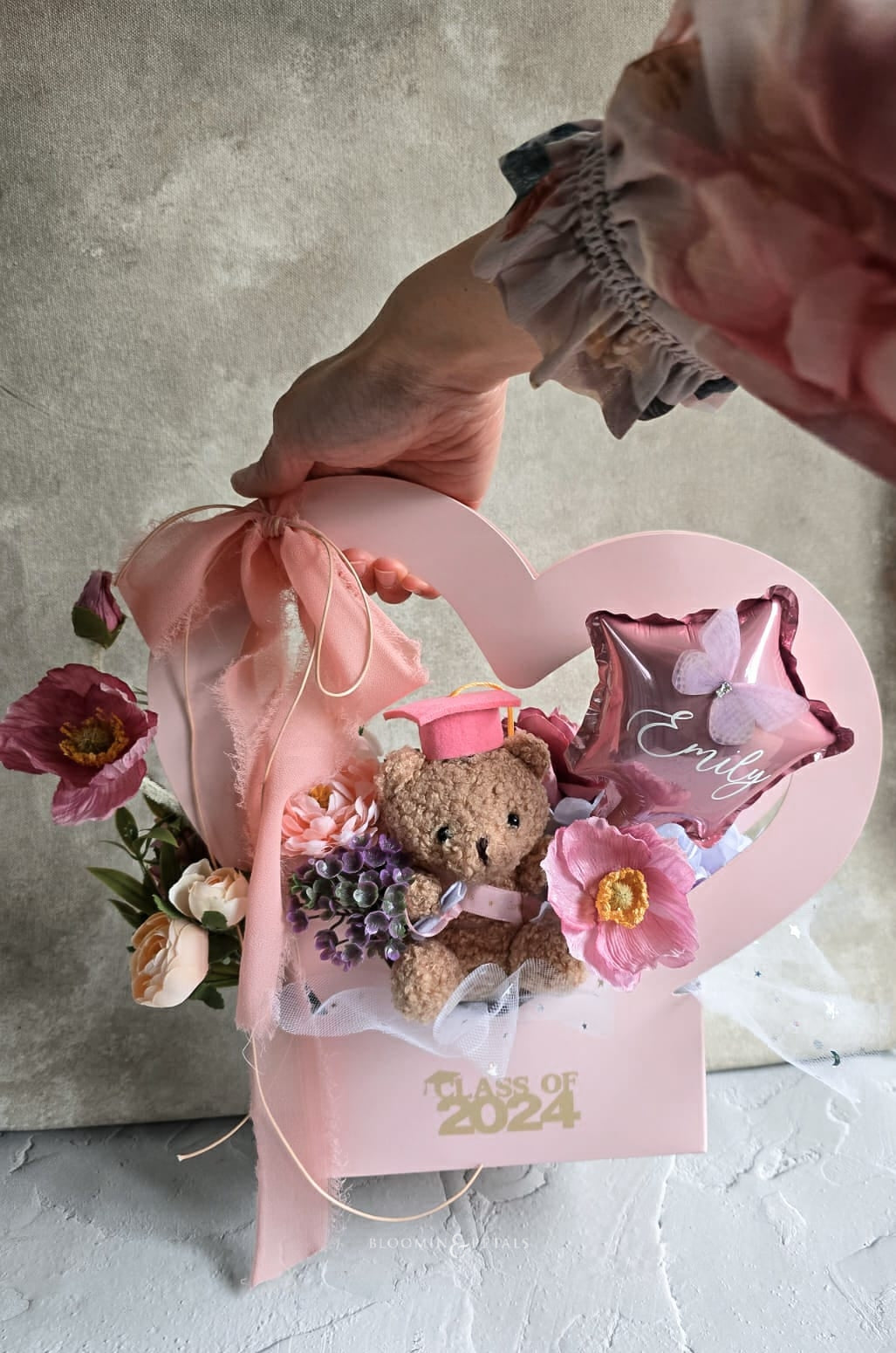 Heart shape box floral arrangement with cute graduation teddy bear and star foil balloon