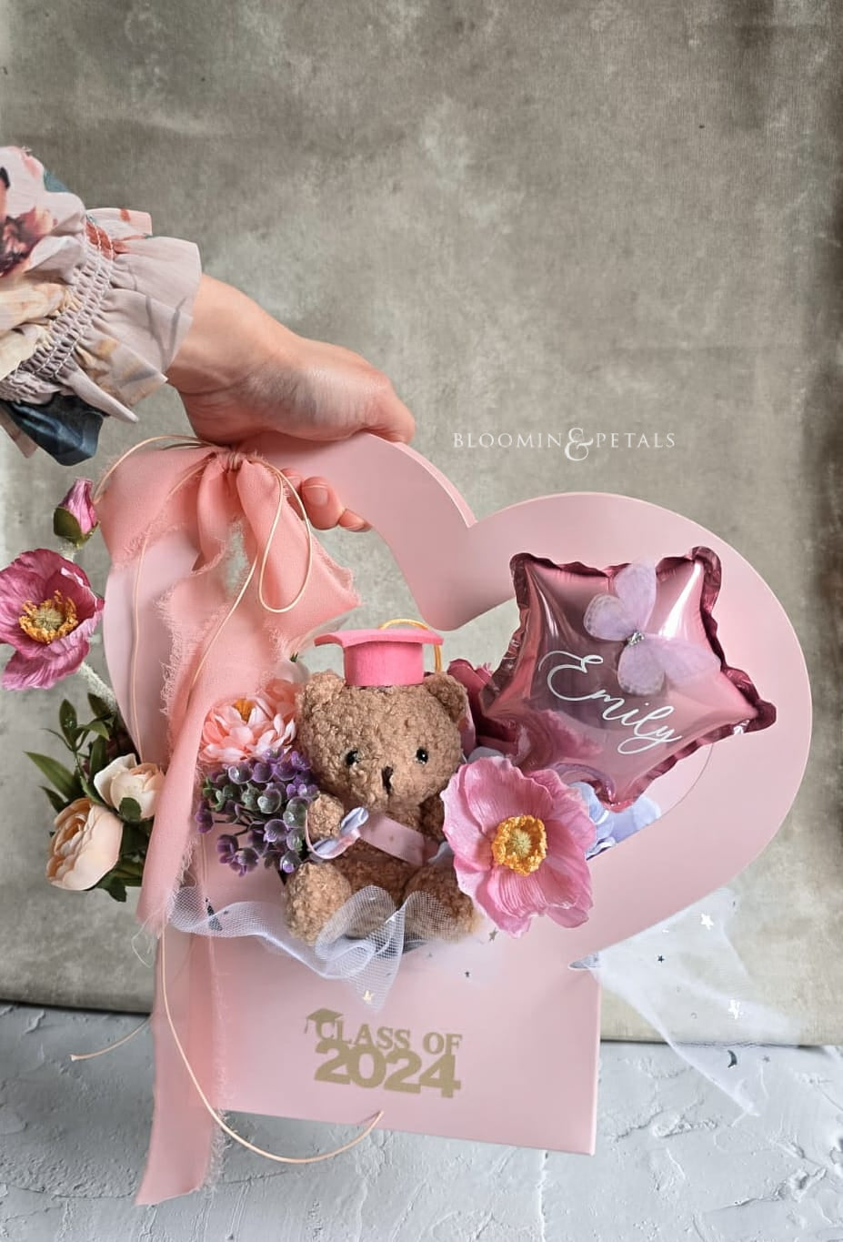 Heart shape box floral arrangement with cute graduation teddy bear and star foil balloon