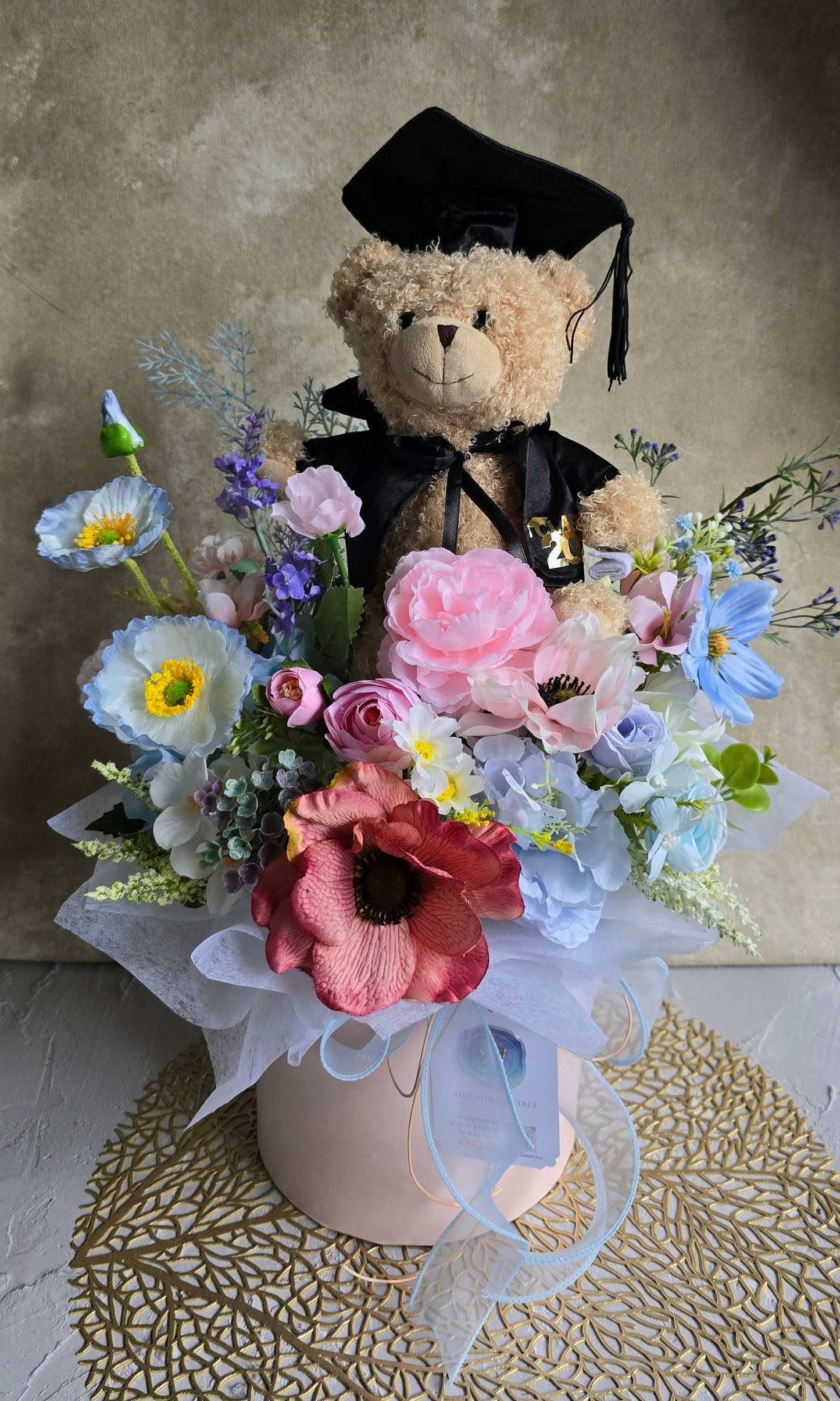 Bloom box graduation teddy bear with beautiful silk flowers