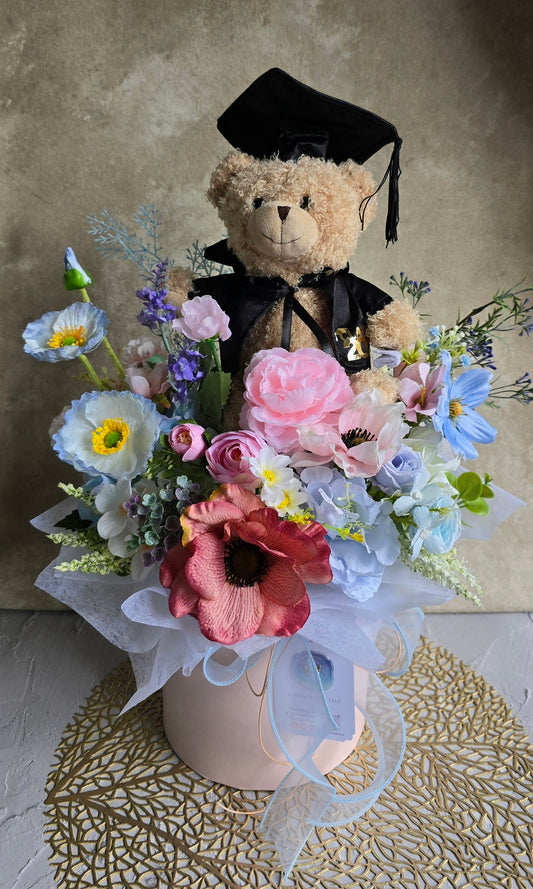 Bloom box graduation teddy bear with beautiful silk flowers