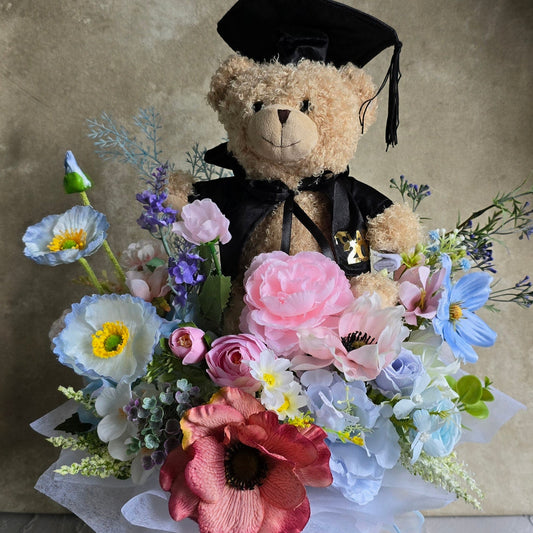 Bloom box graduation teddy bear with beautiful silk flowers