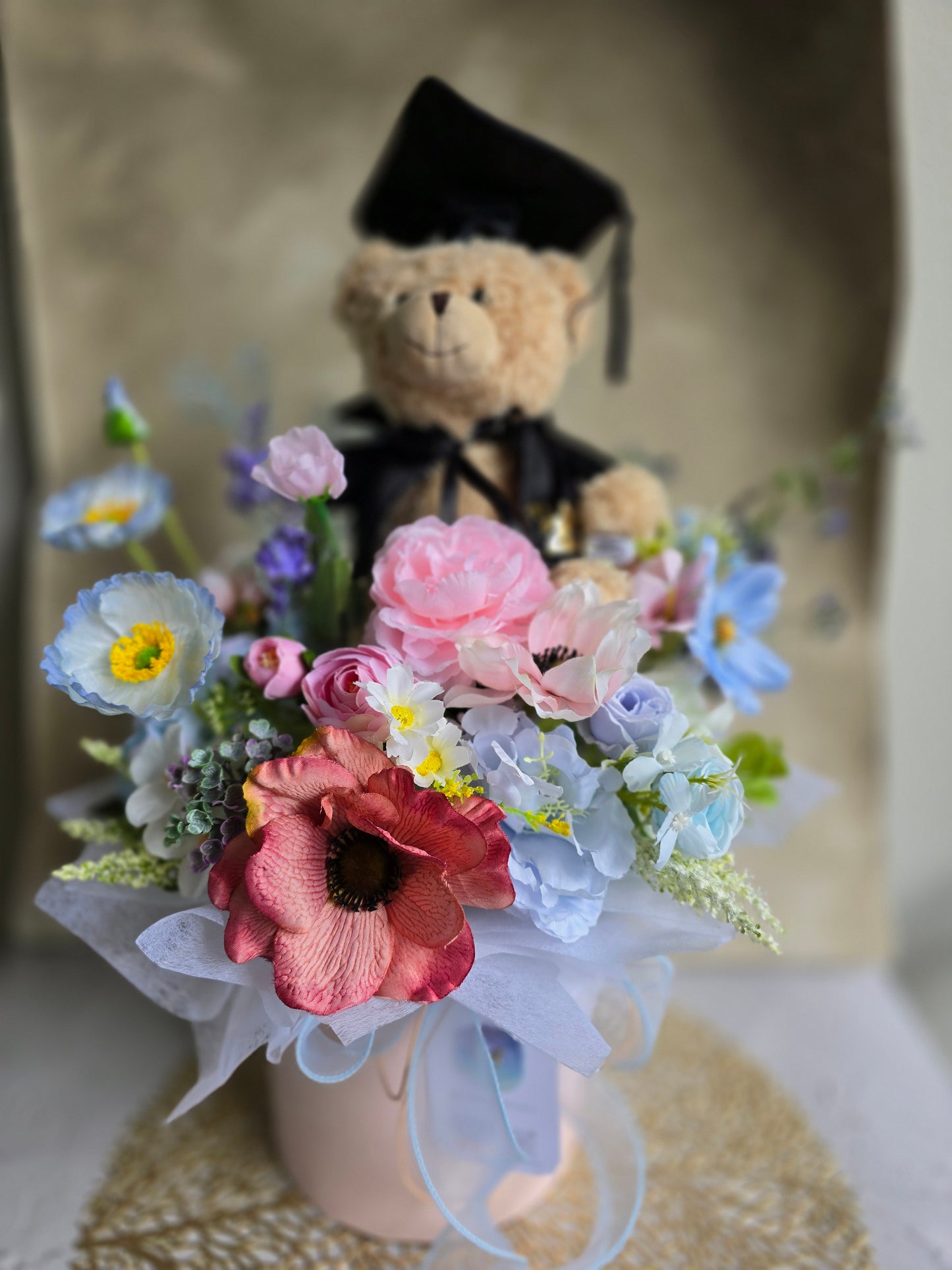 Bloom box graduation teddy bear with beautiful silk flowers