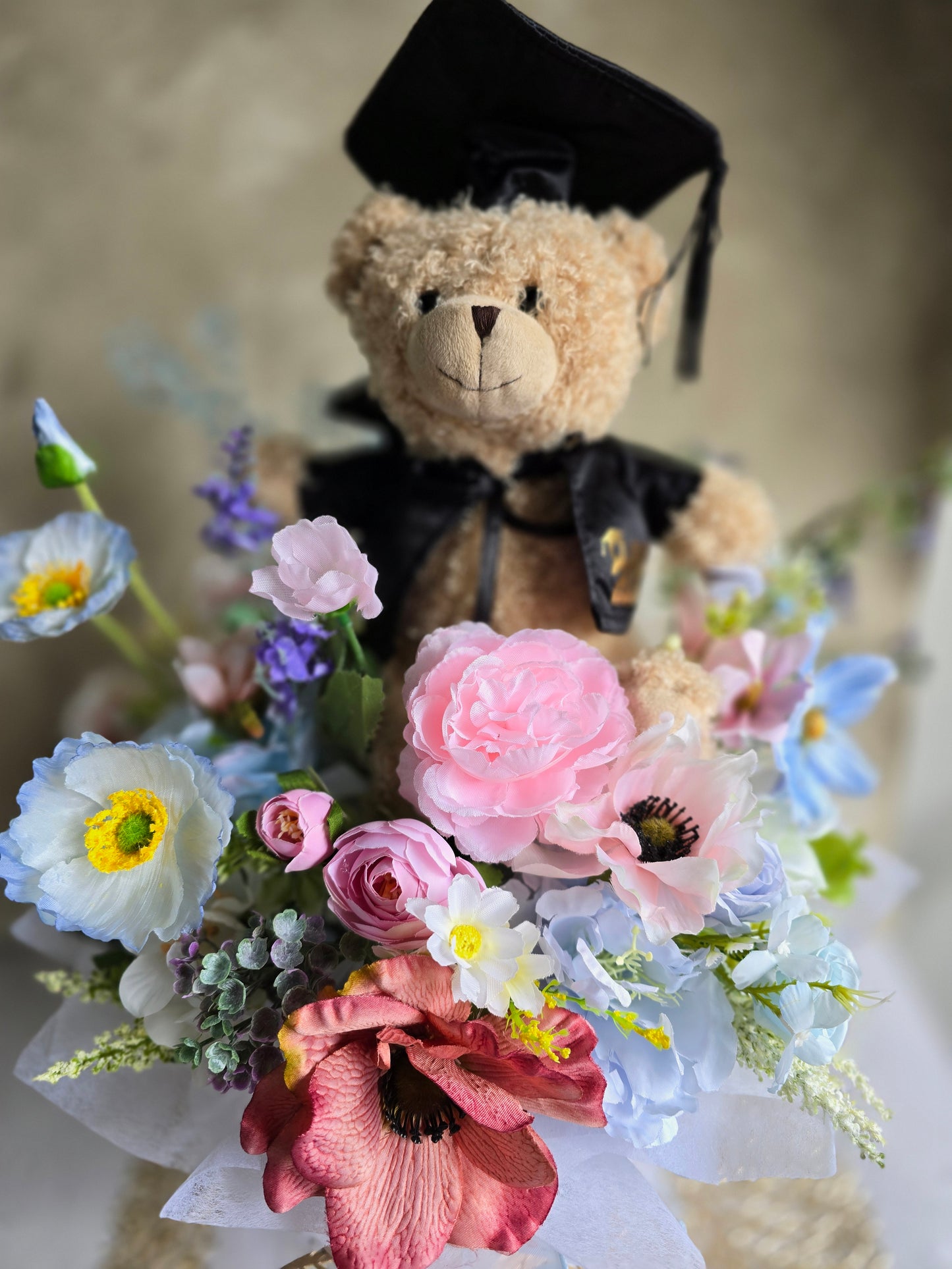 Bloom box graduation teddy bear with beautiful silk flowers