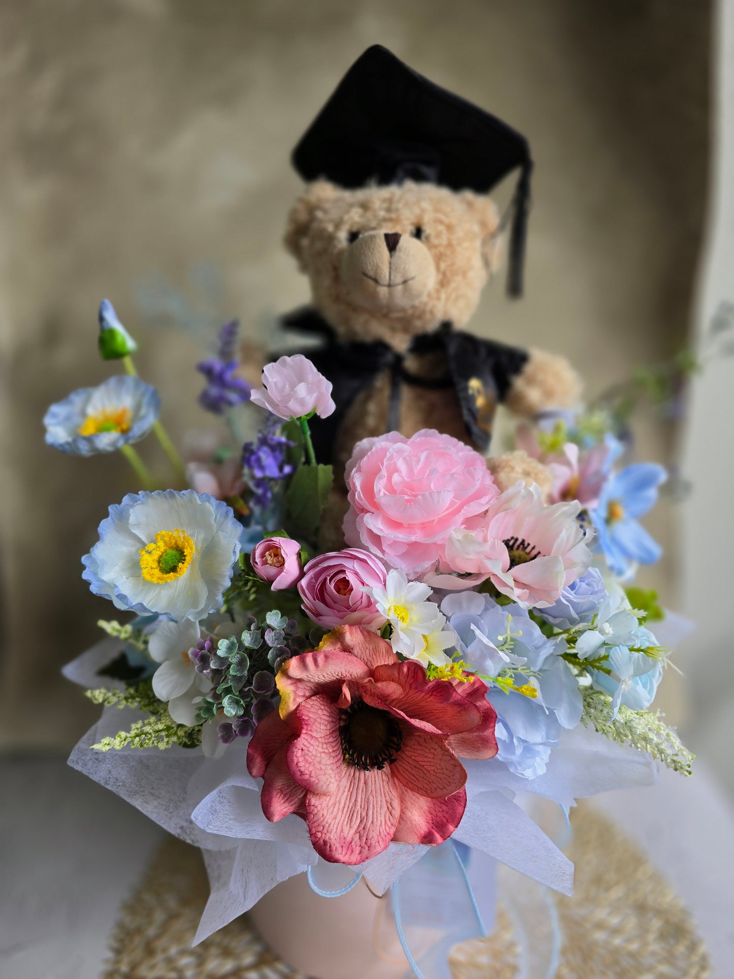 Bloom box graduation teddy bear with beautiful silk flowers