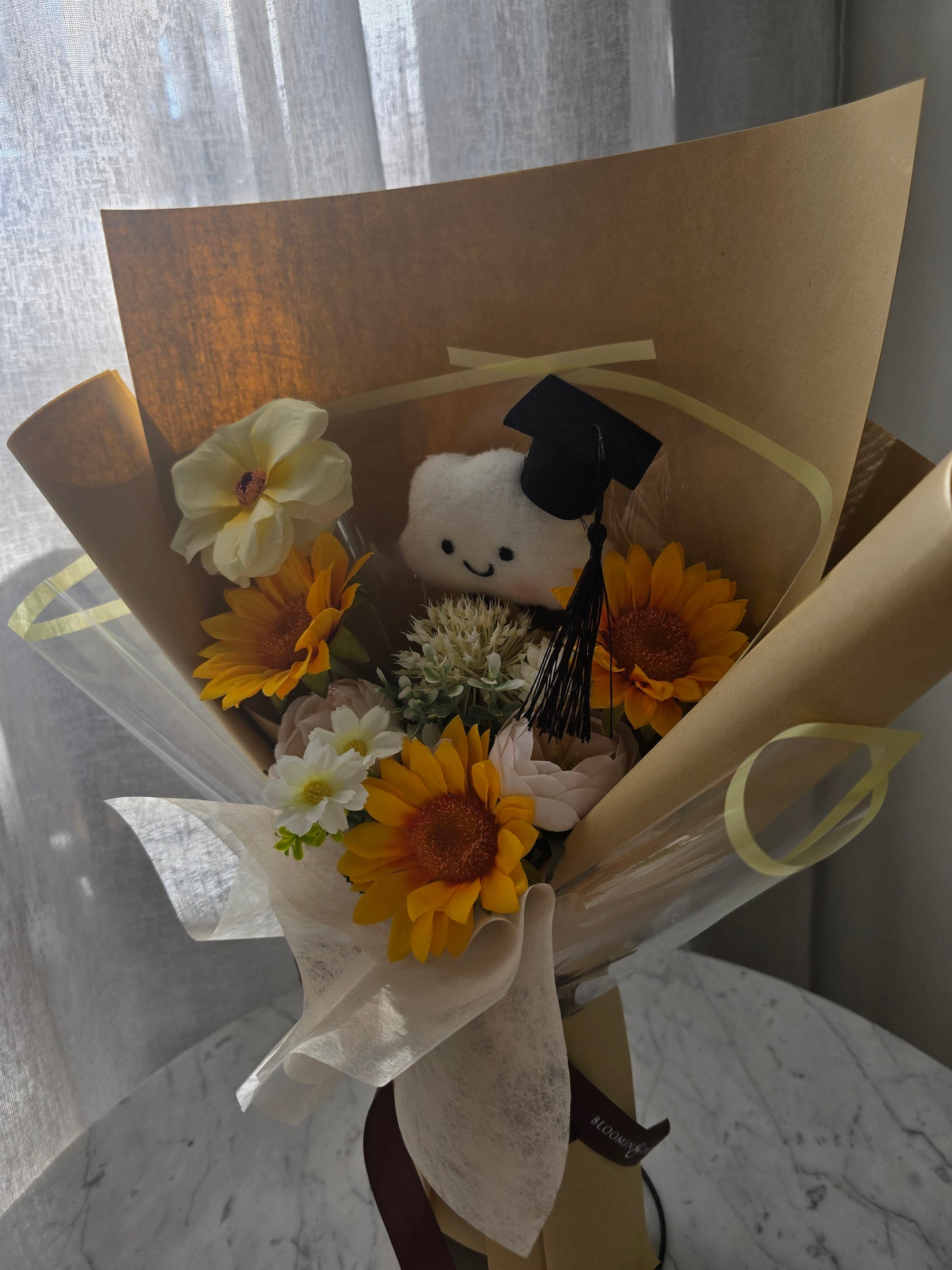 CLOUD PLUSHIE SUNFLOWER GRADUATION BOUQUET