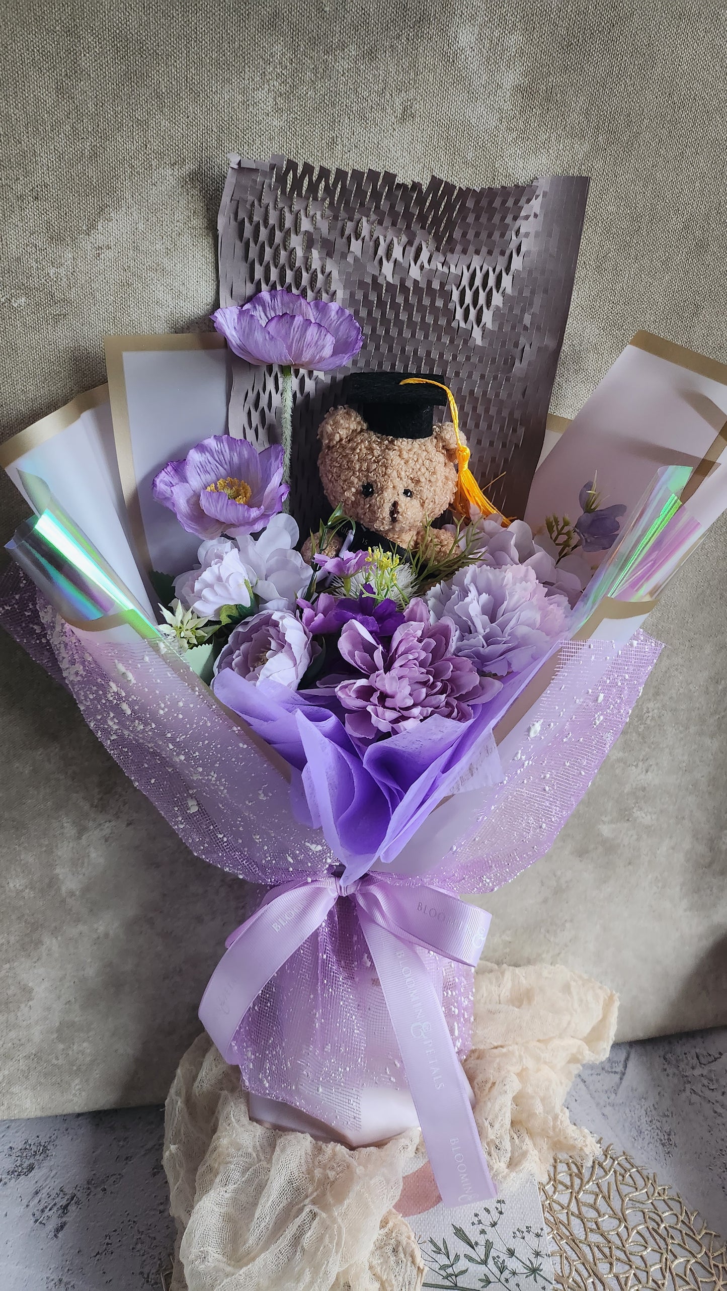 Small teddy bear graduation flower bouquet