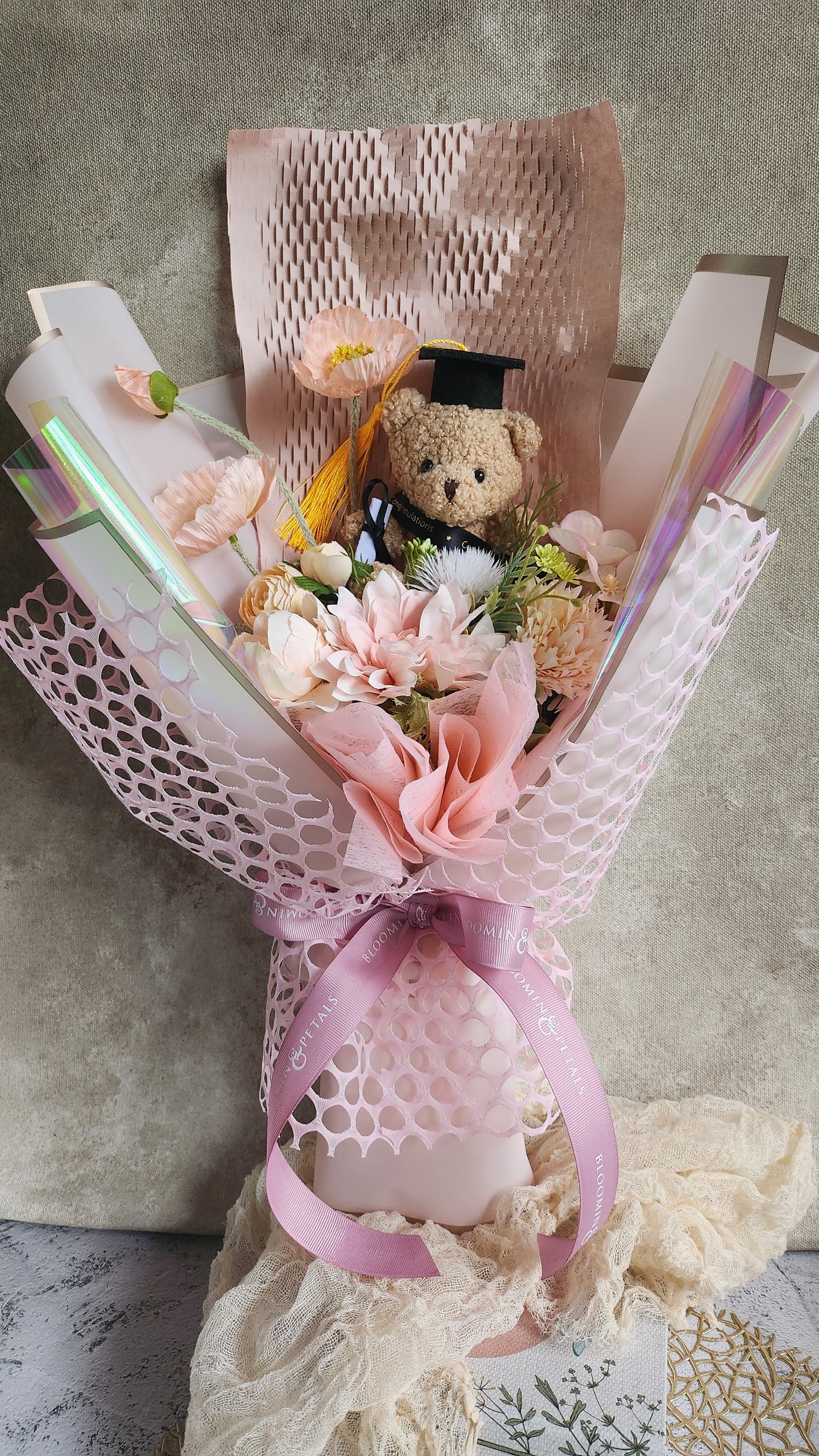 Small teddy bear graduation flower bouquet